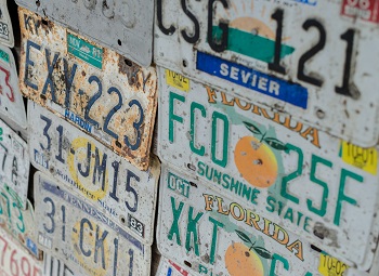 several faded license plates