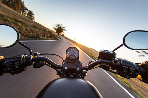 person driving motorcycle