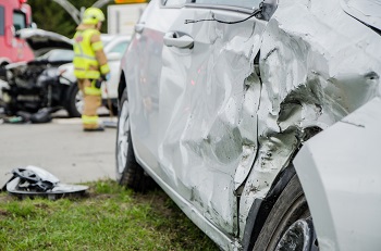 Wrecked Car On Side Of Road